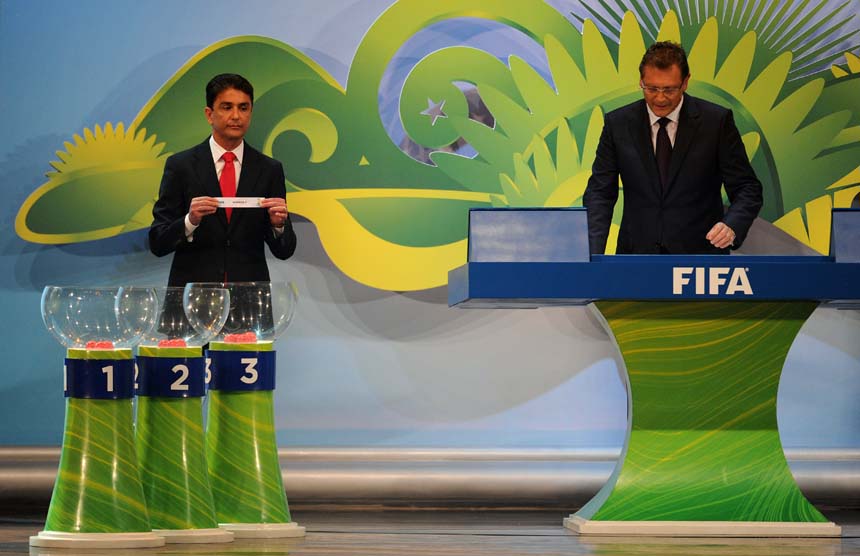 Former Brazil star Bebeto makes the draw for the qualifying stages of the 2014 World Cup.